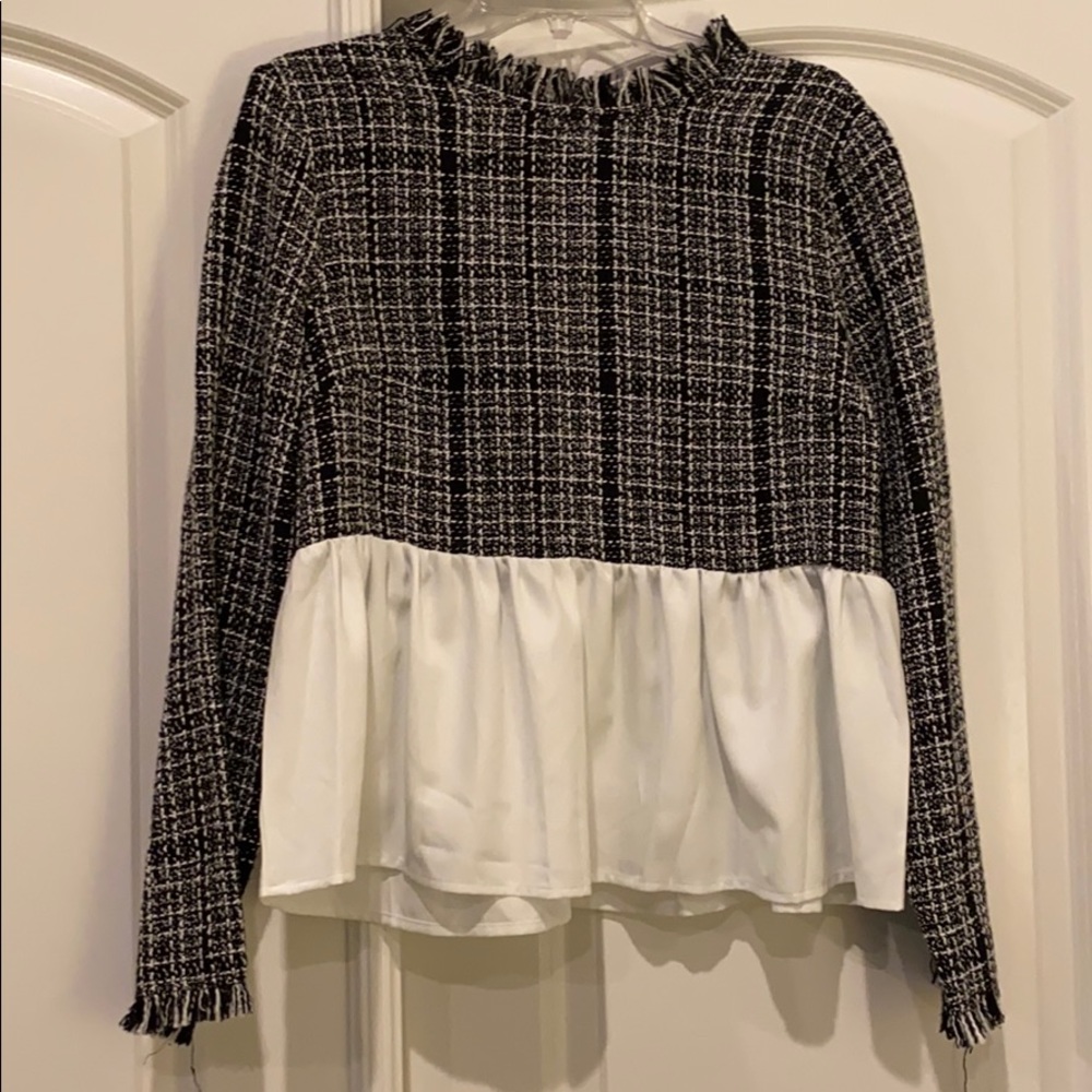 Women’s blouse, new but does not have tags.